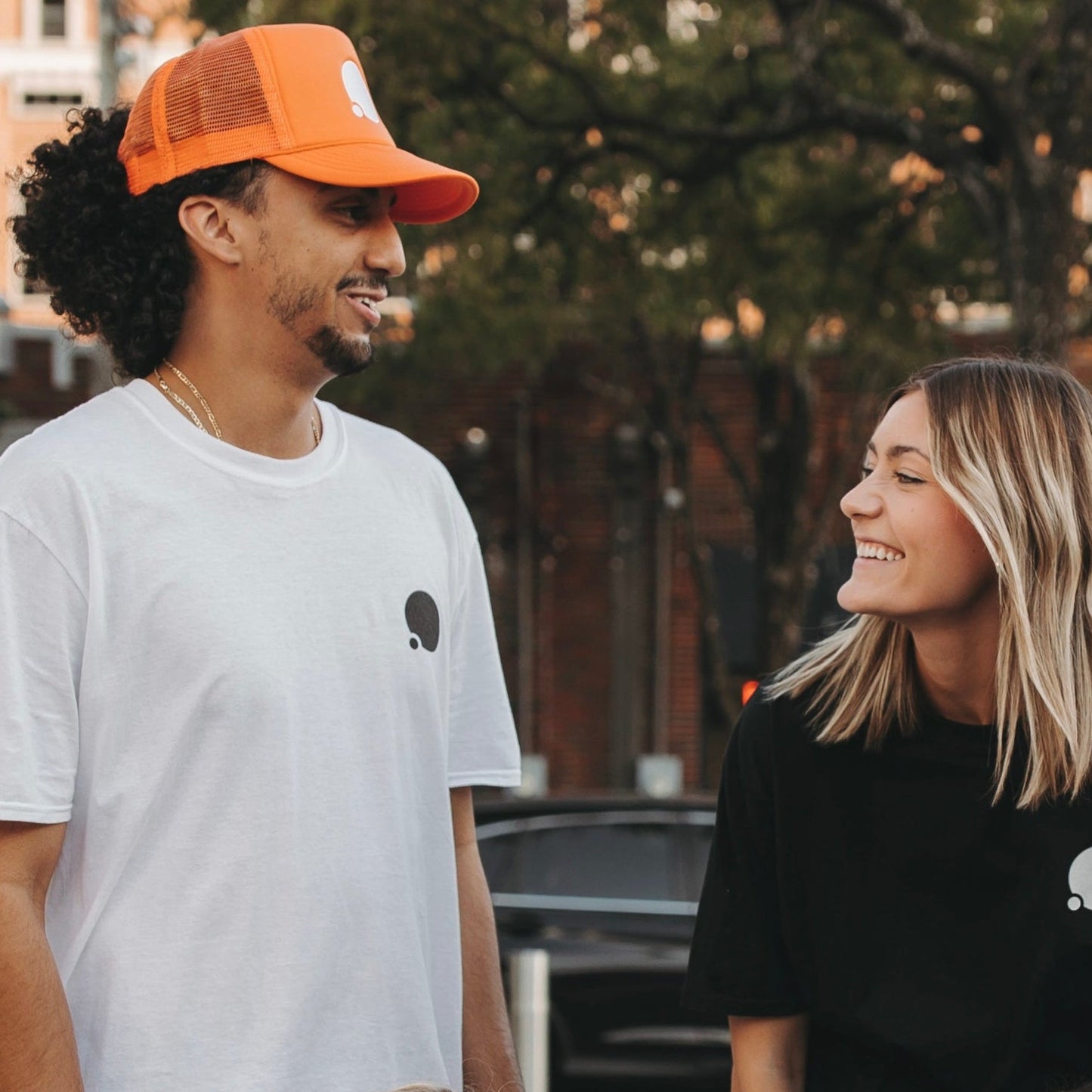 Icon Embroidered Trucker Hat (Tangerine)